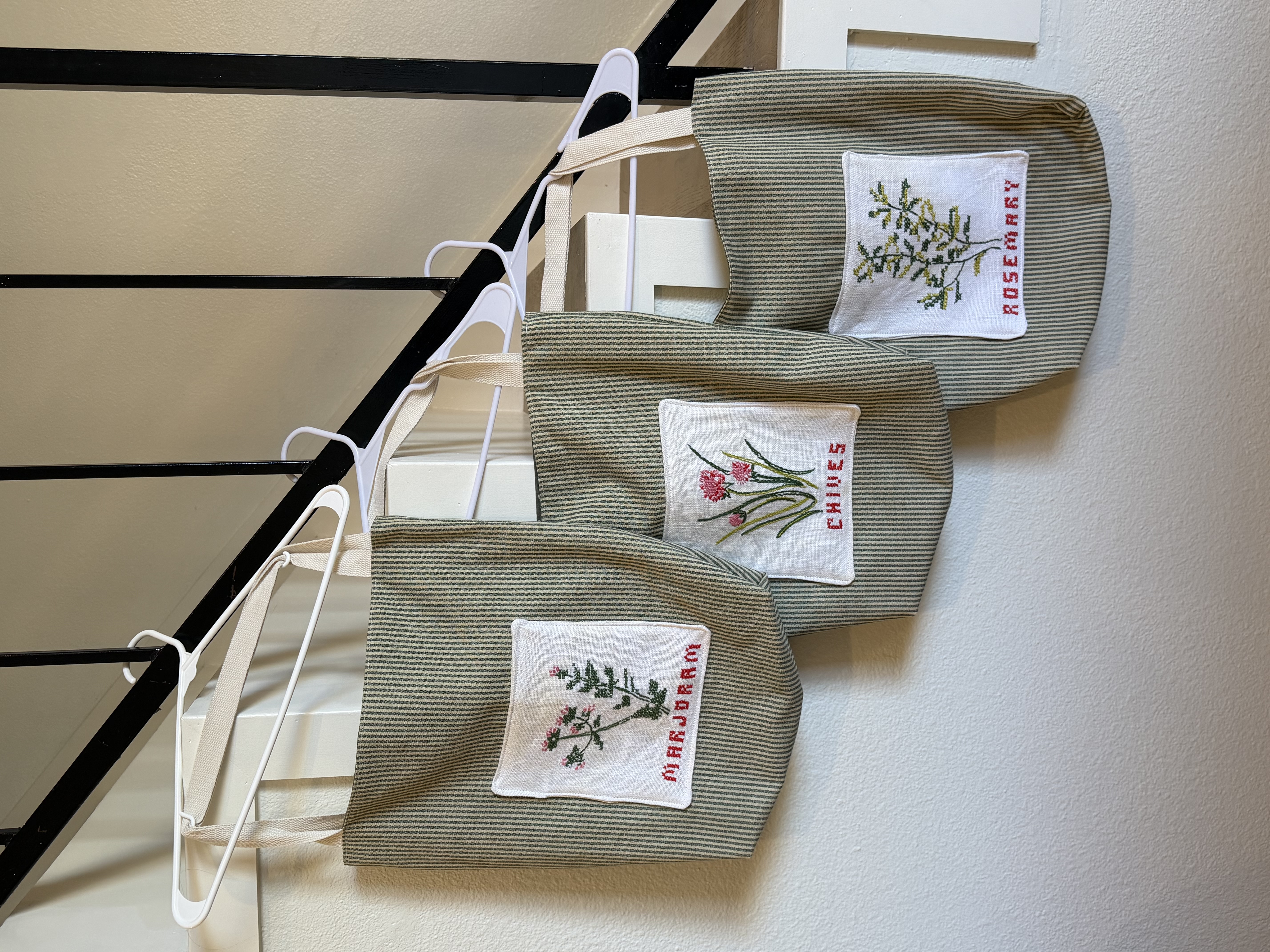 The tote bags together with the printed personality blurbs tucked inside each one